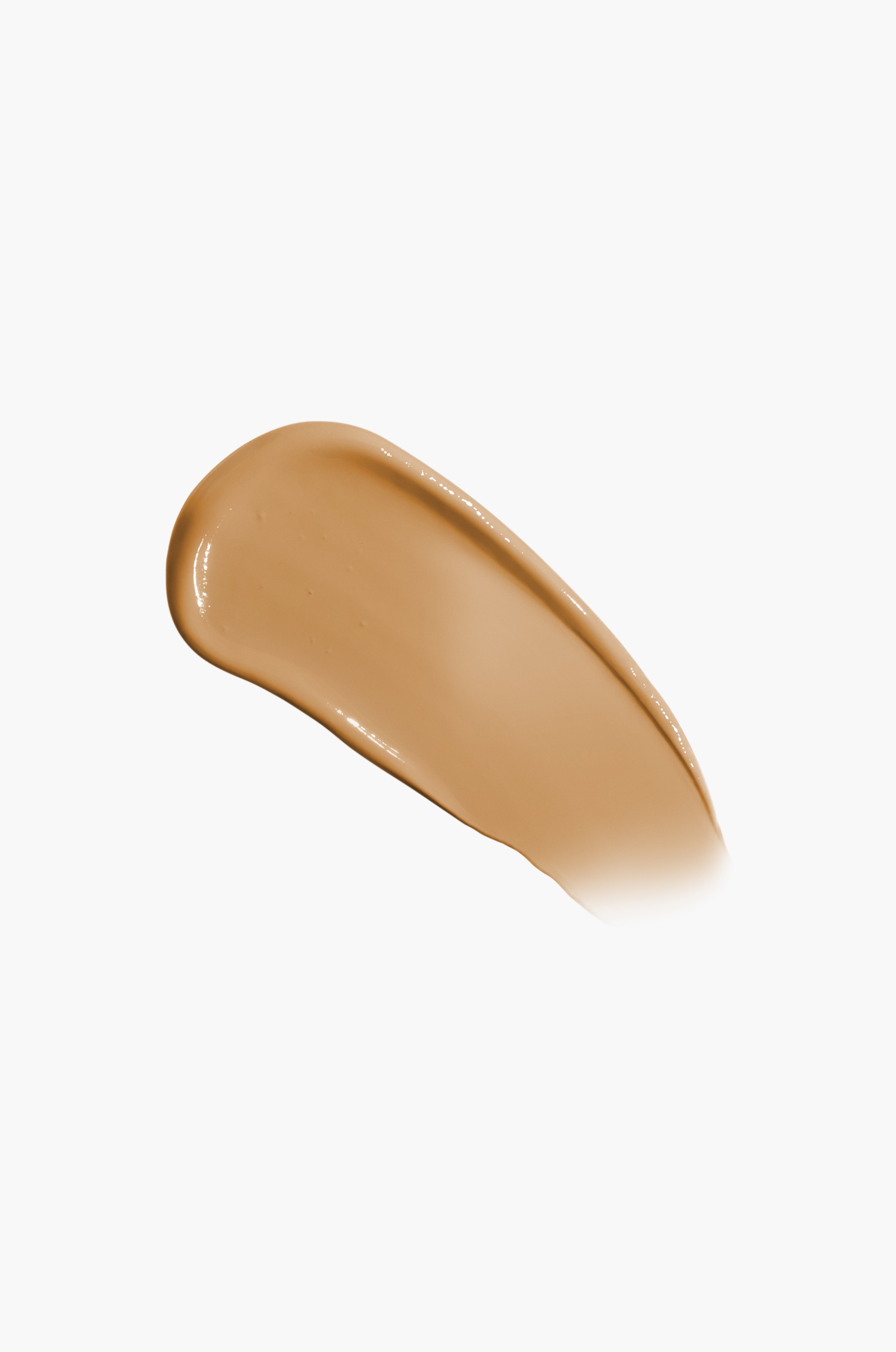 Beige makeup swatch on a white background