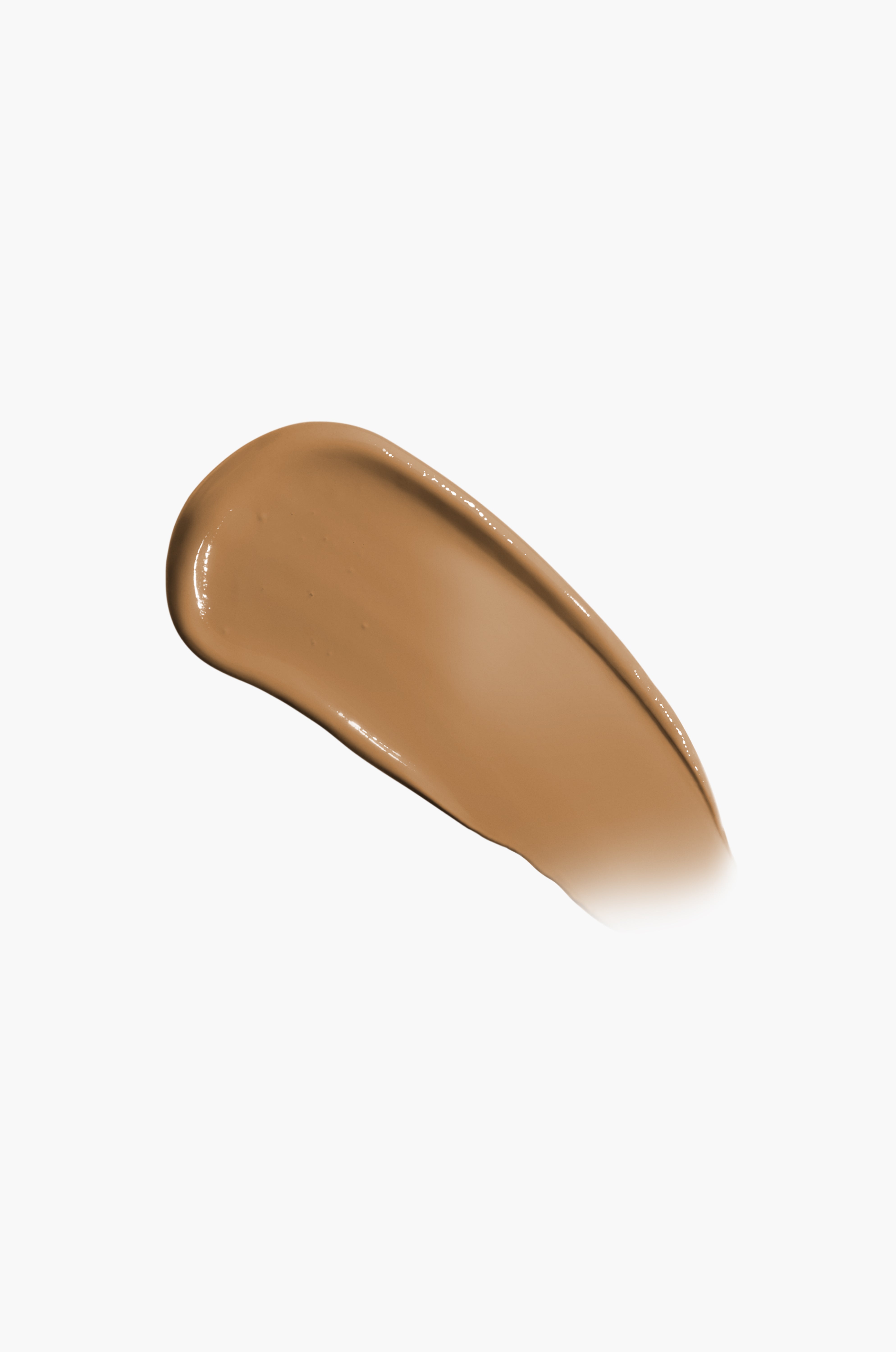 Beige makeup swatch on a white background