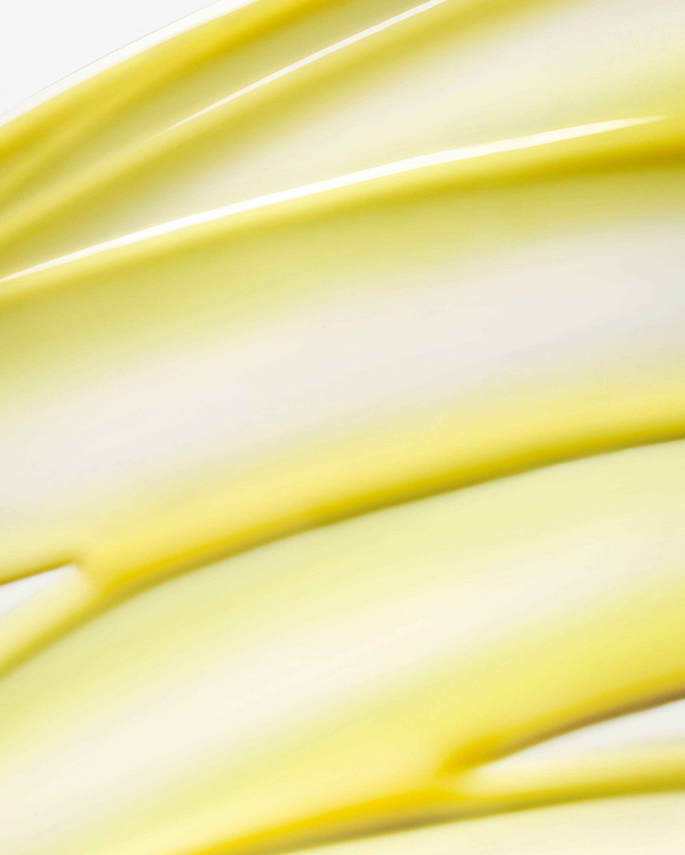 Displays the sheer bright yellow smear of the All Bright C Serum.