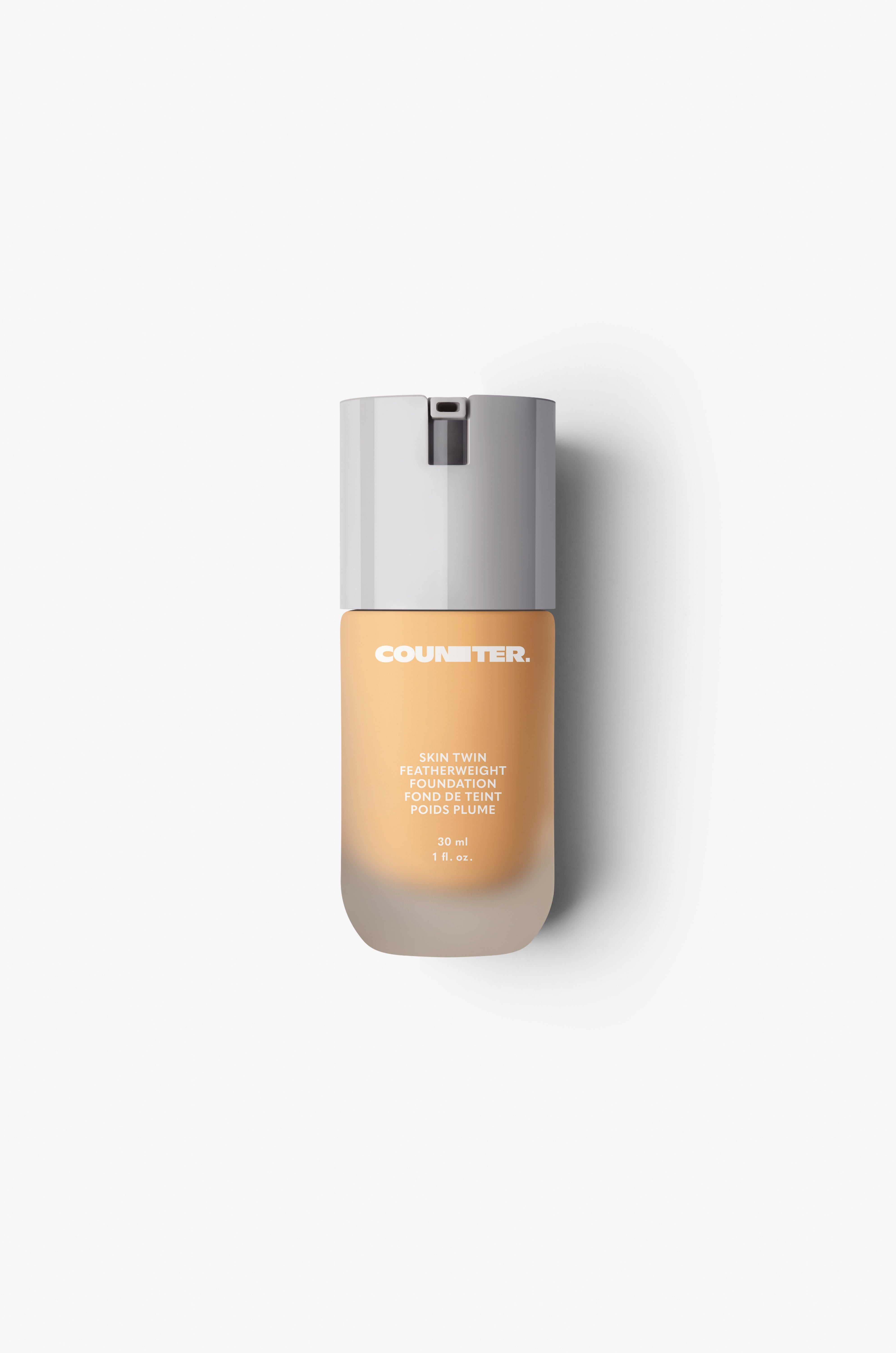 Displays the glass bottle and white lid with foundation shade 320.
