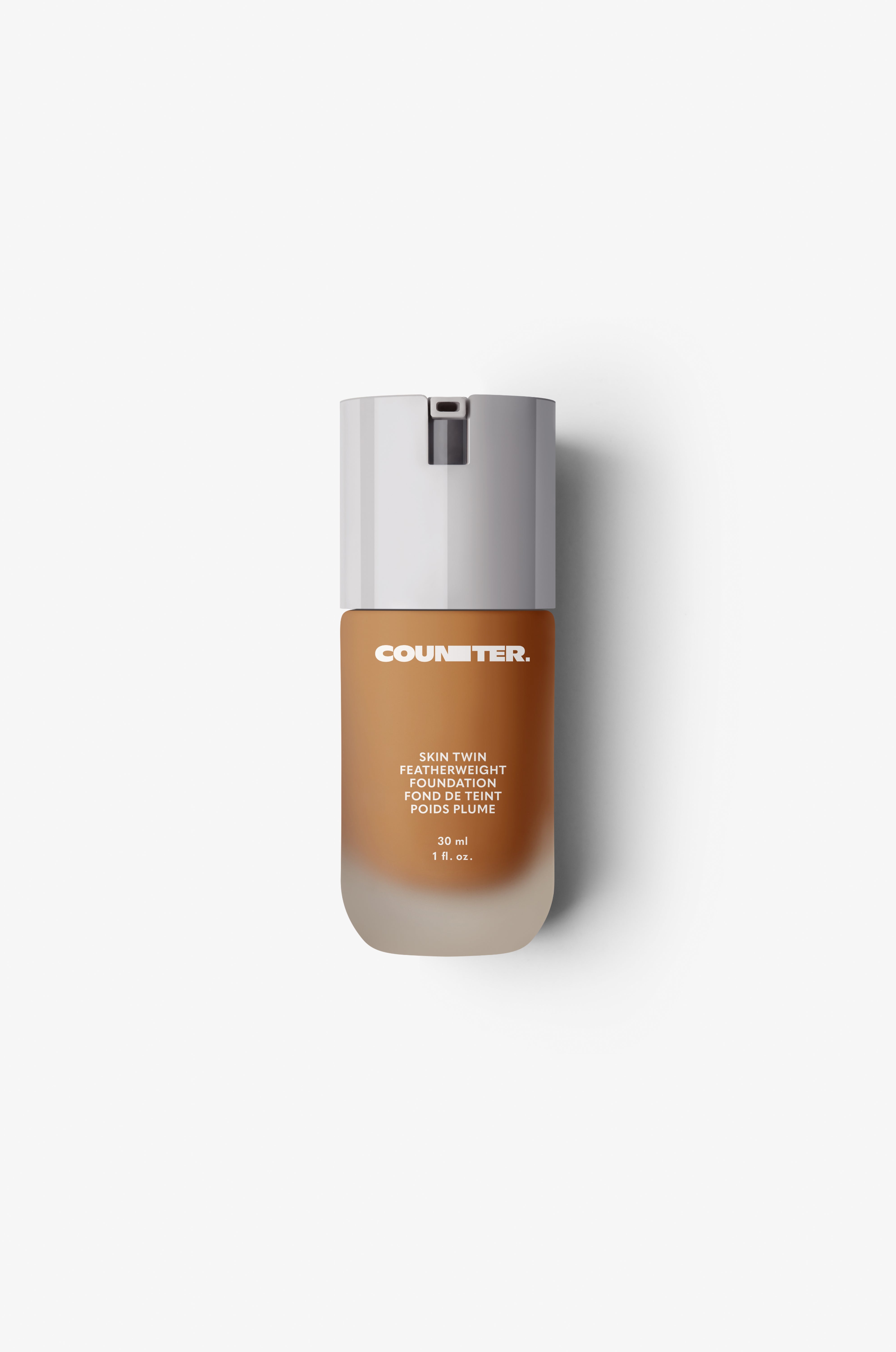 Displays the glass bottle and white lid with foundation shade 460.